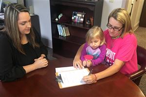 Admissions office working with family of potential student 